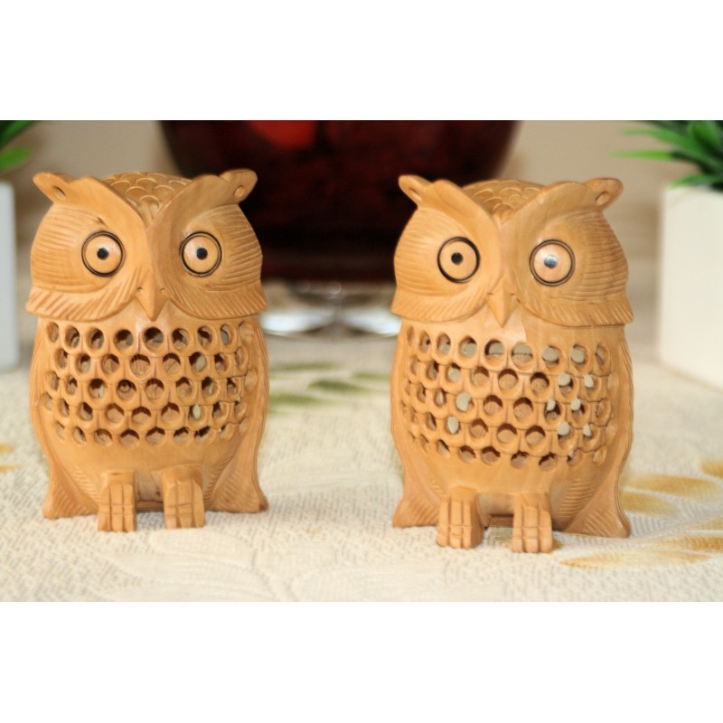 Pair of two adorable hand carved wooden owls.