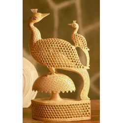 Hand carved wooden peacock with chick figurine